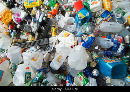 Mixed recyclable containers and materials await sorting at a recycling center Stock Photo