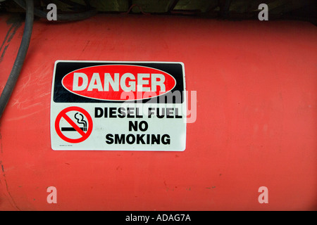 A sign on a diesel fuel tank warns against smoking Stock Photo