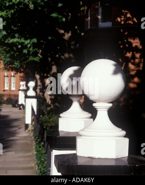Detail of large grand London street property with large white balls painted a traditional white color Stock Photo