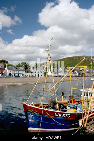 UK Scotland Wester Ross Highland Ullapool Fishing Boat at pier Loch Broom and the town Stock Photo