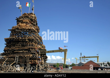Bonfire in East Belfast with Harland and Wolff crane in the background Stock Photo