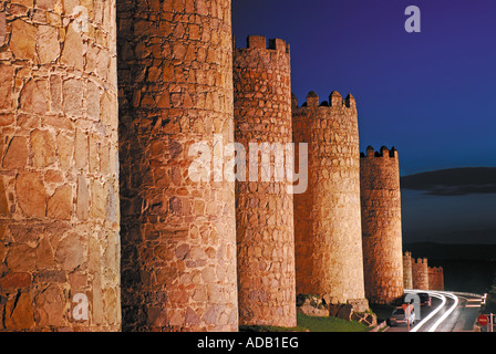 Medieval city walls of Worldheritage town Avila by night, Castilla-Leon, Spain Stock Photo