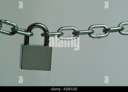 Metal Chain Secured With A Padlock Stock Photo