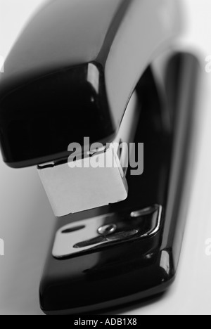 Close Up of an Office Stapler Against a White Background Stock Photo