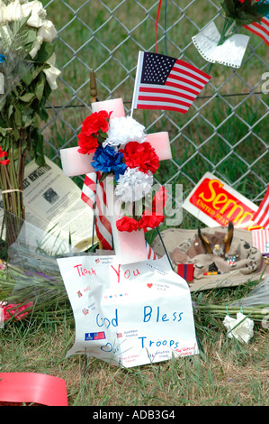 Friends and family grieving at memorial for 14 Marines Killed in Iraq by IED all from Ohio reserve unit in Brook Park Ohio Stock Photo