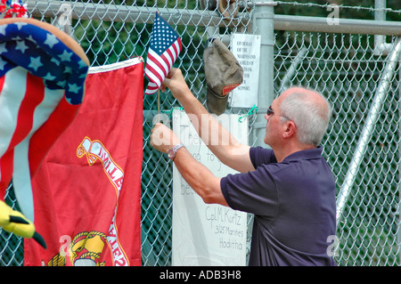 Friends and family grieving at memorial for 14 Marines Killed in Iraq by IED all from Ohio reserve unit in Brook Park Ohio Stock Photo