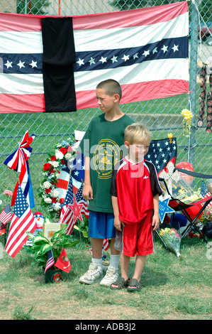 Friends and family grieving at memorial for 14 Marines Killed in Iraq by IED all from Ohio reserve unit in Brook Park Ohio Stock Photo