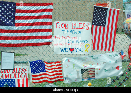 Friends and family grieving at memorial for 14 Marines Killed in Iraq by IED all from Ohio reserve unit in Brook Park Ohio Stock Photo