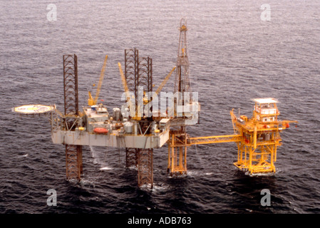 Offshore oil drilling platform in ocean Stock Photo