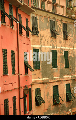 Typical old traditional buidlings with green shutters in Vernazza in ...