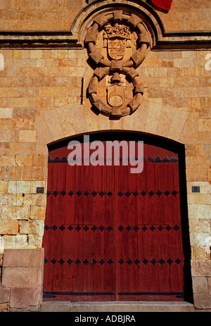 Red wooden doors at the University of Salamanca Salamanca Province Castile Leon Spain Europe Stock Photo