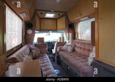 Interior furnishings seating converts to bed in two birth* coach built VW RV Volkswagen Auto Sleeper Clubman camper van view to drivers cab England UK Stock Photo