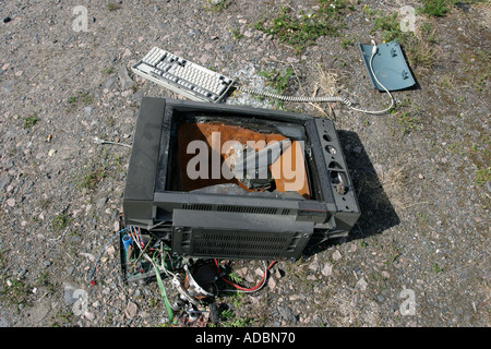 broken tv set on ground Stock Photo