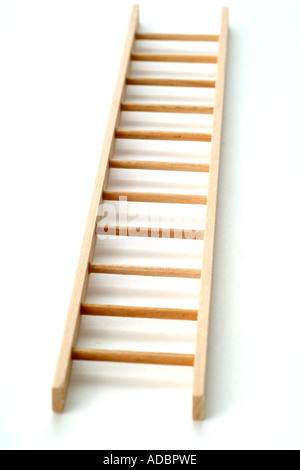 Simple model wooden ladder on white background backdrop Stock Photo