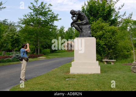 The Thinker 1904 by Auguste Rodin at the Frederik Meijer Gardens and Sculpture Park in Grand Rapids Michigan MI Stock Photo