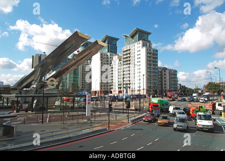 Bus station and major traffic interchange junction on south side of Vauxhall Bridge with new riverside apartments beyond Stock Photo