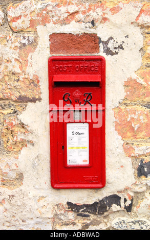 George VI red post box set in wall of house at Cefngorwydd near Llanwrtyd Wells Powys Mid Wales UK Stock Photo