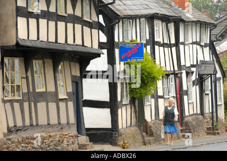 Row of black and white timber framed cottages at Pembridge Herefordshire England UK Stock Photo