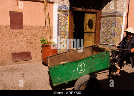 moroccan man pushing an empty  cart in the streets of the old city,The medina,Marrakesh,Morocco Stock Photo