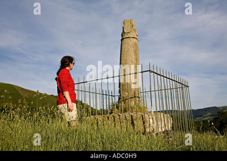 Woman looking at Elisegs Pillar Llangollen Wales UK Stock Photo