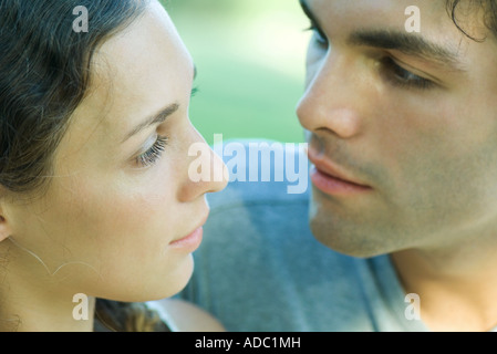 Couple looking at each other, extreme close-up Stock Photo