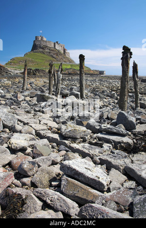Lindisfarne Castle from the old jetty Holy Island Northumberland England Stock Photo