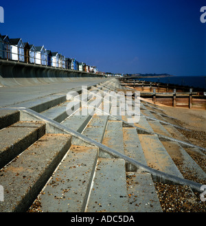 Concrete steps and wave return wall used as coastal defence the Dip Felixstowe Suffolk England Stock Photo