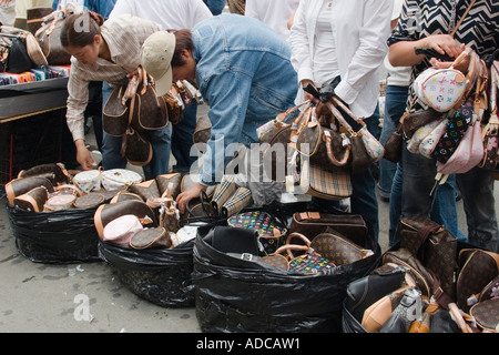 Vendors selling imitation designer bags on Canal Street in New York City.  Part 2 