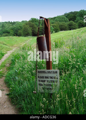 Bakewell Golf Course warning bell to golfers that walkers are on footpath Stock Photo