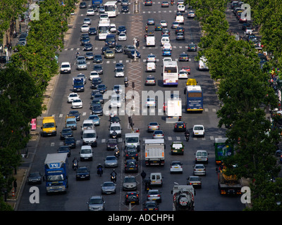 Busy heavy traffic on Avenue des Champs Elysees Paris France Stock Photo