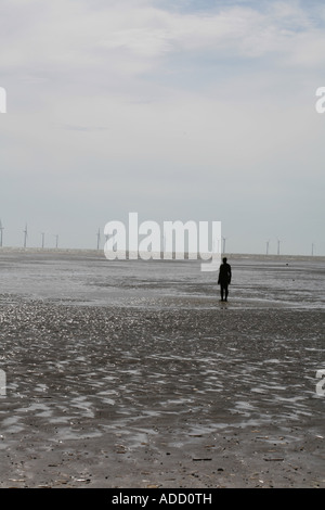 Anthony Gormley Another Place a series of figure sculptures on the beach at Crosby near Liverpool merseyside england Stock Photo