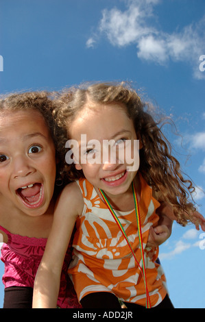 Mixed race sisters aged 6 and 4 Stock Photo