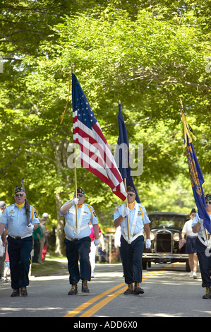 Color Guard of American Veterans marching in a home town New England Fourth of July Parade Brooklin Maine Stock Photo