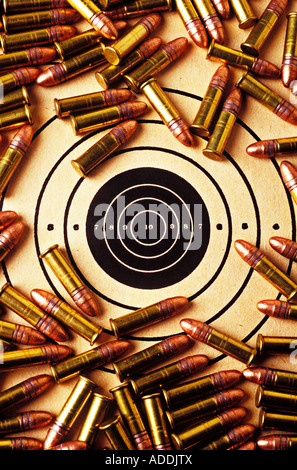 Target with bullets on bullseye Stock Photo