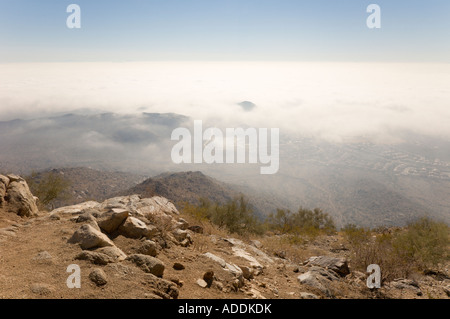 Thick fog settles over Ahwatukee Arizona as seen from South Mountain Stock Photo