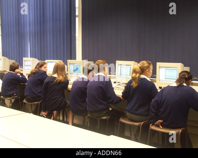 Students in school using computers Stock Photo