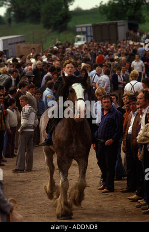 1980s Appleby Gypsy Fair Appleby in Westmorland Cumberland teen boy showing horse  thats up for sale, dealers watching how it moves. UK. HOMER SYKES Stock Photo