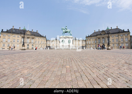 The square of Amalienborg Royal Palace featuring King Frederik V Statue. Copenhagen, Denmark. Stock Photo