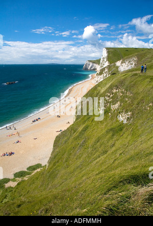 Coastal footpath at 'Durdle Door' looking towards 'Bats Head' and 'Swyre Head' on sunny summers day Dorset England UK Stock Photo