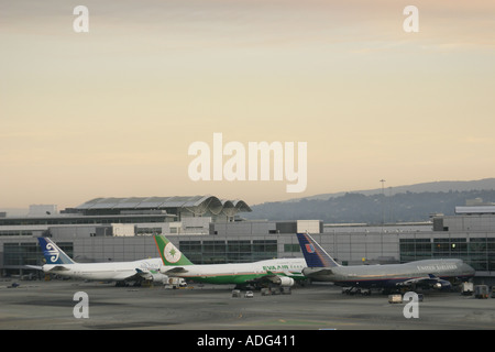 Jumbo jets at San Francisco International Airport Air New Zealand EVA Airways United Airlines Stock Photo