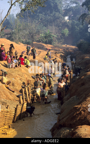 Panning for rubies in a small stream by a ruby mine in Mogok ,the Ruby mining center of Burma Myanmar . Stock Photo