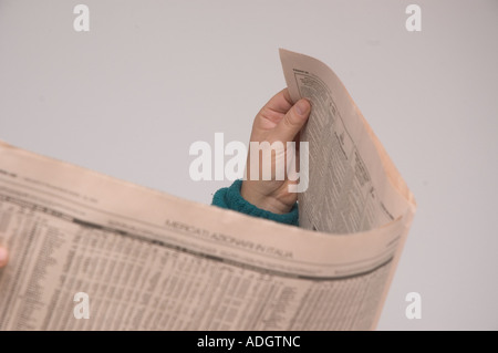 lecture of a newpaper Stock Photo