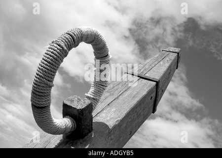 Anchor Iron Ring & Post wrapped or covered in whipped rope & knot at MacDuff Harbour, Aberdeenshire, Scotland, UK Stock Photo