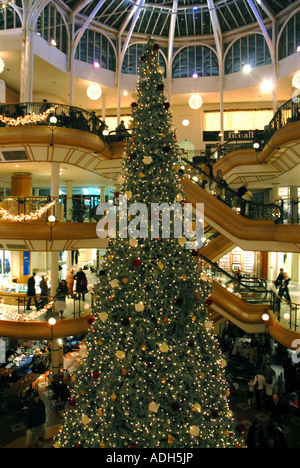 Decorated  Christmas Tree at the Princes Square Shopping Centre, Glasgow. Scotland. Christmas Eve, December