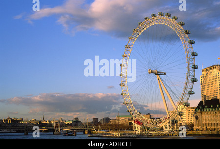 London Eye in late evening sunshine with a blue sky, Westminster, London Stock Photo