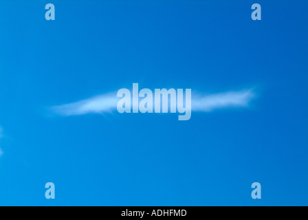 White Cirrus Clouds High in a Blue Sky Over Cheshire England Stock Photo