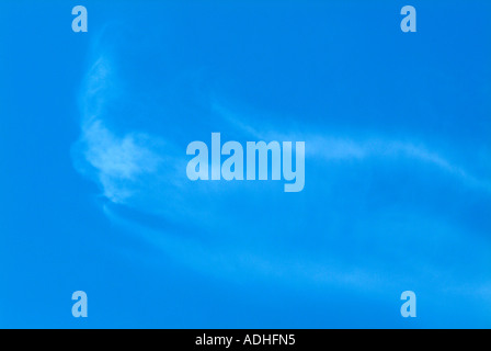White Cirrus Clouds High in a Blue Sky Over Cheshire England Stock Photo