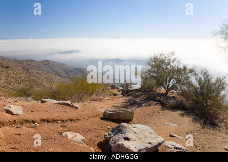 Thick fog settles over Ahwatukee Arizona as seen from South Mountain Stock Photo