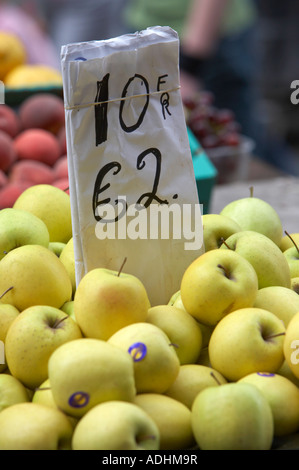 green apples with sign 10 ten for 2 two euro prices at outdoor market dublin Stock Photo