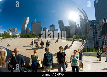 Tourists & Chicago Bean or Cloud Gate Sculpture / Millennium Park Stock Photo